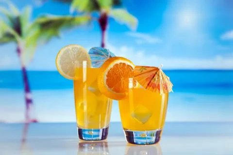 Tropical drinks on beach Stock Photos
