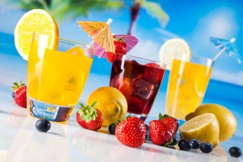 Tropical drinks on beach Stock Photos