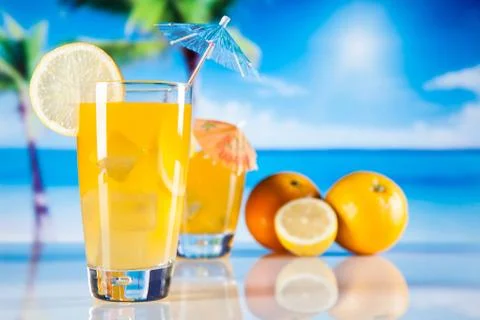 Tropical drinks on beach Stock Photos