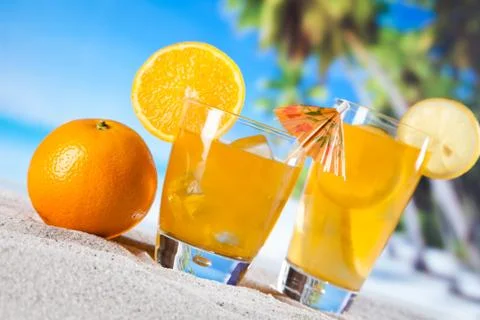 Tropical drinks on beach Stock Photos