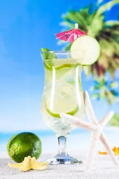 Tropical drinks on beach Stock Photos