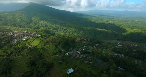 Tropical forest, clouds, vegetable farm and city. Fog, mist in mountains Stockbeeldmateriaal 241556787