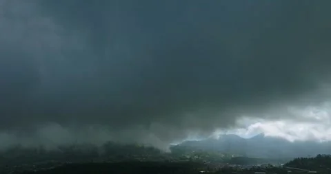 Tropical forest, clouds, vegetable farm and city. Fog, mist in mountains Stock Footage 241779997