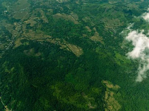 Tropical Forest Under Patchy Cloud Cover - Drone Photo Stock Photos