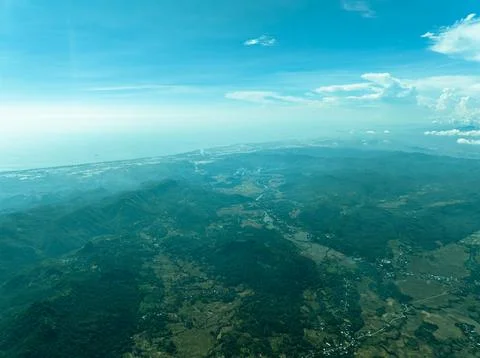 Tropical Forest Under a Soft Cloud Layer - Drone Photo Stock Photos