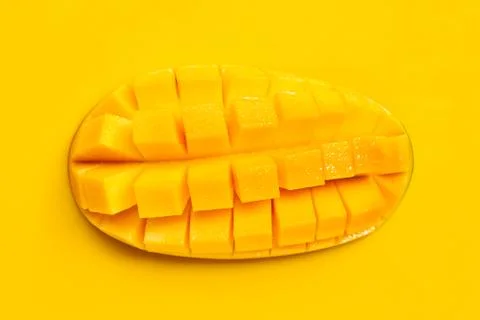 Tropical fruit, Mango  on yellow background. Stock Photos
