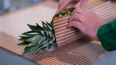Tropical fruit pineapple packaging Stock Footage 172263056