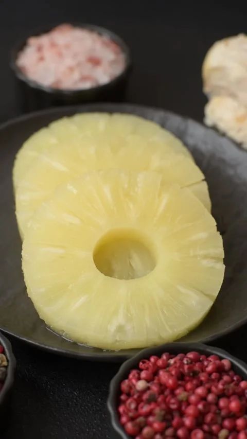 Tropical fruit pineapple in rings or slices tinned sweet Stock Footage 306474027