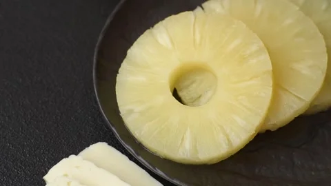 Tropical fruit pineapple in rings or slices tinned sweet Stock Footage 306474033