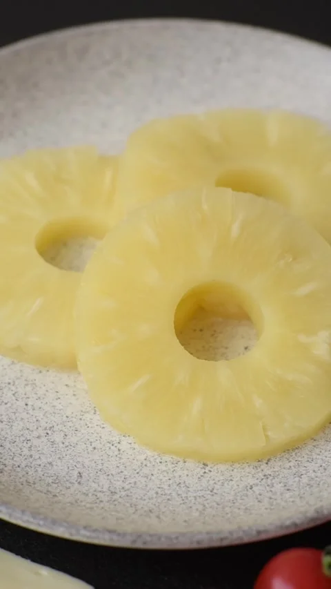 Tropical fruit pineapple in rings or slices tinned sweet Stock Footage 306474042