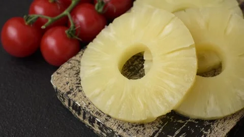 Tropical fruit pineapple in rings or slices tinned sweet Stock Footage 306474069