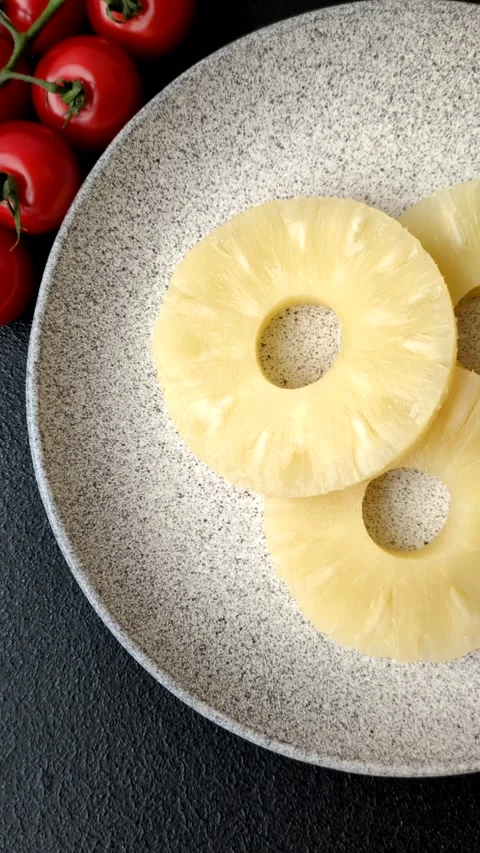 Tropical fruit pineapple in rings or slices tinned sweet Stock Footage 306474132