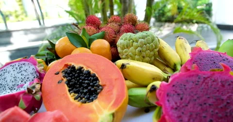 Tropical fruit platter dragon fruit, kiwi, pineapple, and assorted fresh Stock Footage 315314753