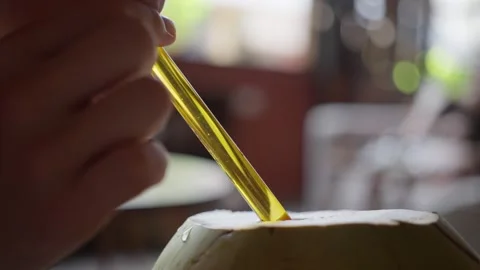 Tropical fruit sipping for healthy snack during summer holidays in slow motion. Stock Footage 251446341