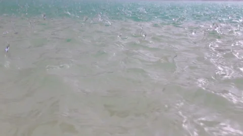 Tropical hard rain storm over lake / pool. HD Stock Footage 48676653