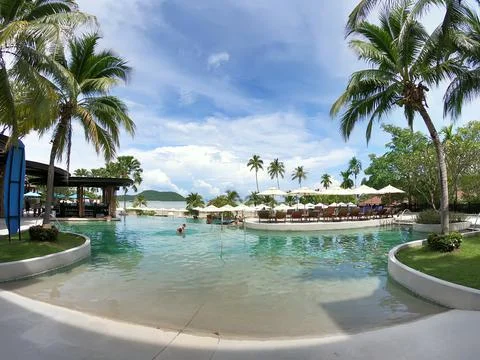 Tropical hotel pool Stock Photos