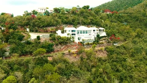 Tropical House on Mountainside Stock Footage 136671844