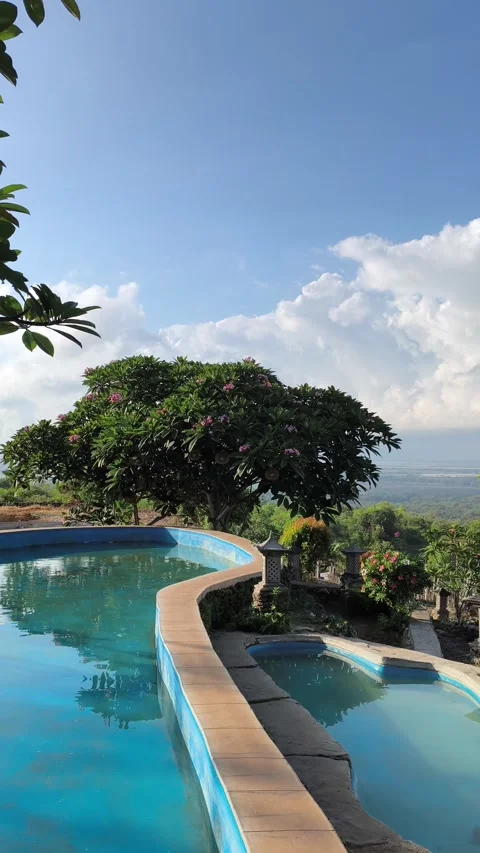 Tropical Infinity Pool with Scenic Valley View and Blue Sky Stock Footage 340215544