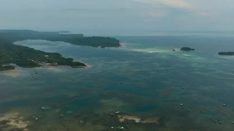 Tropical Island and Fish Farm over the sea in the Philippines. Stock Footage 252245833