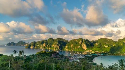 Tropical island Phi Phi with mountains, lake, and sky reflecting in the water Stock Photos