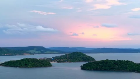 Tropical islands surrounded by deep blue ocean at golden hour Stock-Footage 341328416