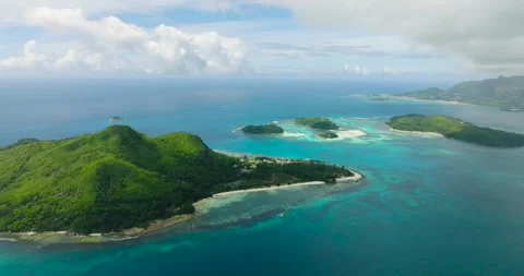 Tropical islands surrounded by turquoise waters. Seychelles, Mahe. 스톡 동영상 345384734