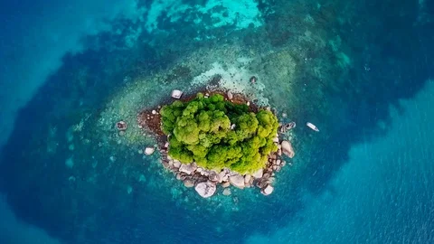 Tropical islet with a reef Video stock 129896845