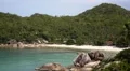 Tropical Lagoon with Cliffs, Stones and White Sand Beach. HD Footage