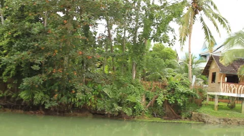Tropical luxury river mansion Stock Footage 43679342