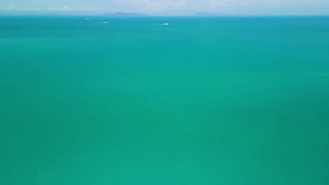 Tropical Ocean Horizon With Distant Cargo Ships Stock-Footage 340538389