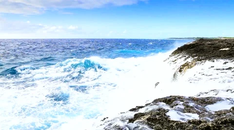 Tropical ocean's waves breaking on the reef shore Stock Footage 60696824