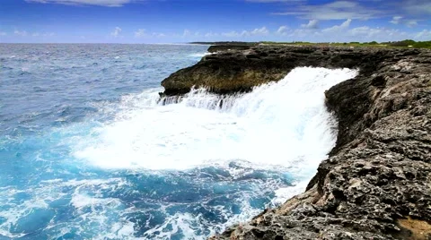Tropical ocean's waves breaking on the reef shore Stock Footage 60696847