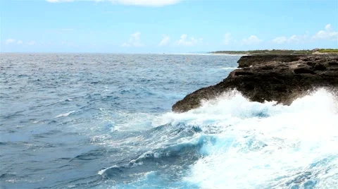 Tropical ocean's waves breaking on the reef shore Stock Footage 60697032