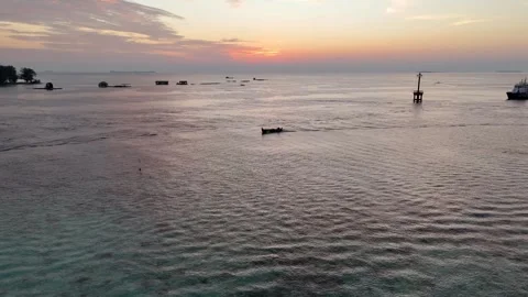Tropical paradise in Karimunjawa during a dramatic orange sunset. Stock-Footage 337281874
