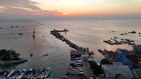 Tropical paradise in Karimunjawa during a dramatic orange sunset. Stock-Footage 337281979