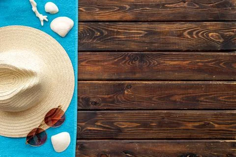 Tropical pattern top view. Beach accessories with sraw hat with sunglasses Stock Photos