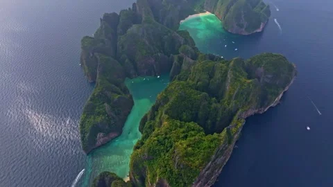 Tropical Phi Phi Lee island aerial with Maya Bay and blue sea Stock Footage 303358142