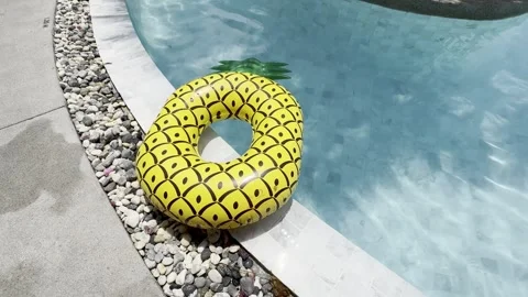 Tropical pool with pineapple float, perfect relaxation. Stock Footage 303470959