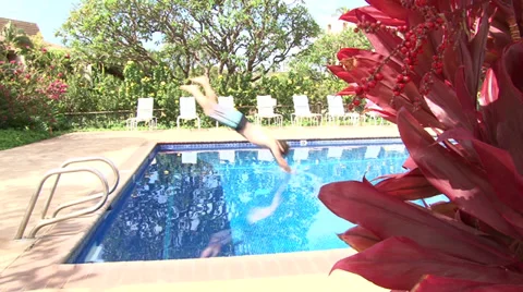 Tropical Poolside Diver Stock Footage 37838521