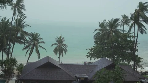 Tropical rain pours into the hotel Impiana Resort Chaweng Noi stock footage Stock Footage