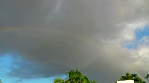 Tropical Rainbow - rain clouds Stock Footage 10743507