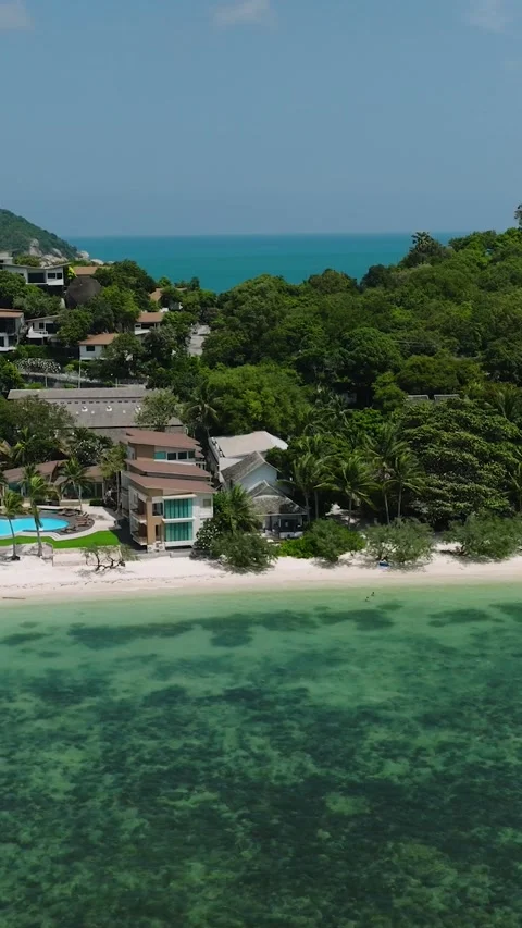 Tropical resort along pristine beach with turquoise water. Rin Nai Beach. Ko Pha Stock Footage 301446735
