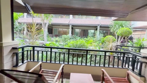 Tropical Resort Balcony View Overlooking Lush Garden in Phi Phi Islands Stock Footage 330850651