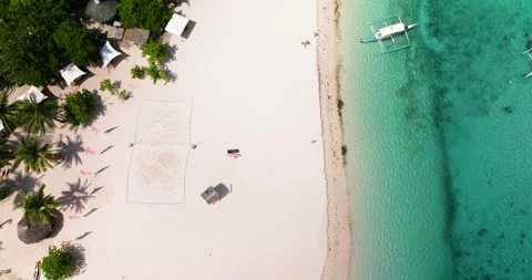 Tropical sandy beach and blue sea. Philippines Stock Footage 243491900