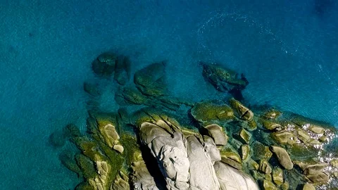 Tropical sandy beach with large rocks and blue sea Stock Footage 91070688