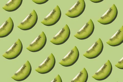 Tropical seamless pattern on green background. Flat lay, trendy juicy color. Stock Photos