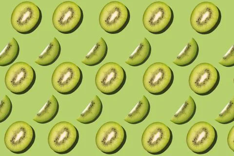 Tropical seamless pattern on green background. Flat lay, trendy juicy color. Stock Photos