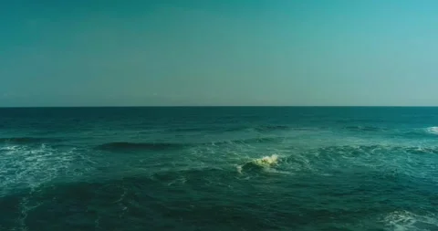 Tropical Shoreline with Rolling Ocean Waves in Indonesia Video stock 332145764