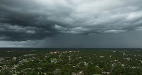 Tropical storm in Florida. Stormy clouds forming during heavy thunderstorm on 動画素材 274471797