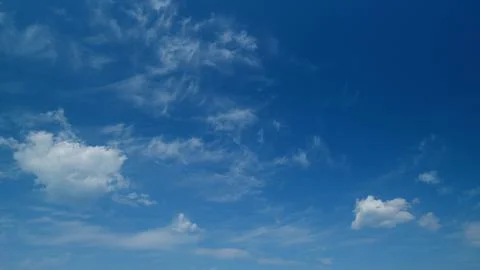 Tropical summer or spring sunlight with cumulus and cirrus on different layers Foto stock